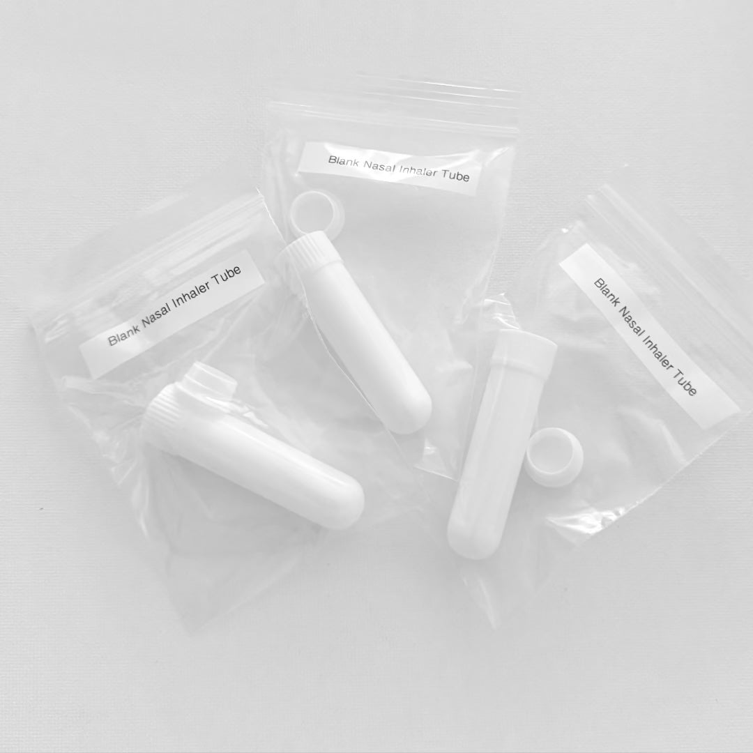 Three clear plastic zip-top bags labeled 'Blank Nasal Inhaler Tube' containing white plastic tubes and caps, arranged on a light gray background.