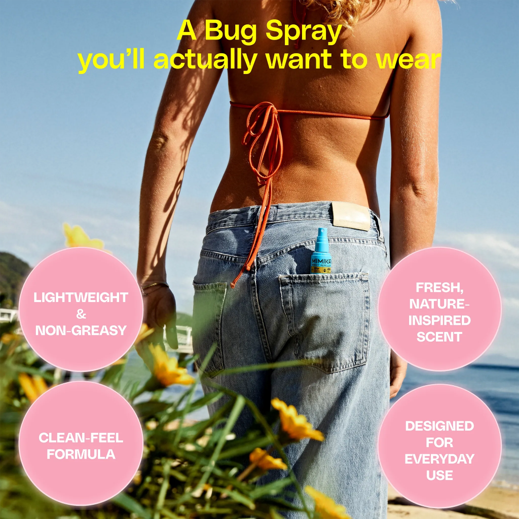 Person carrying a bug spray with text highlighting features on a beach.
