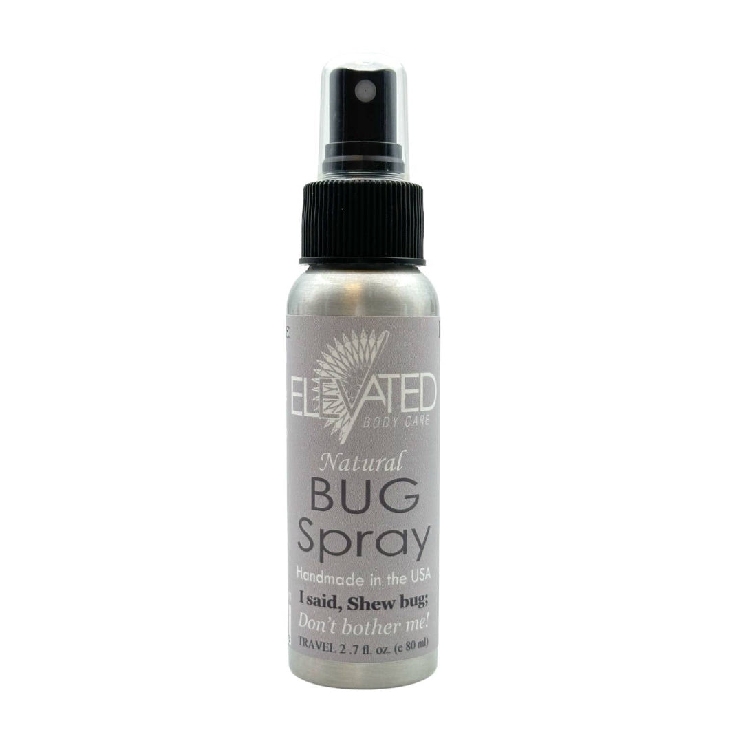 Bottle of Elevated Body Care natural shew bug spray on a white background